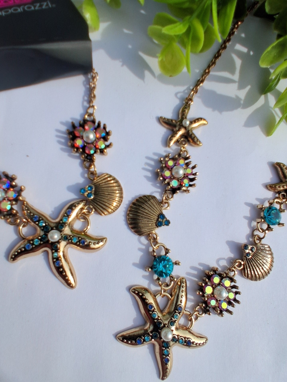 Gold Tone Starfish Necklace And Bracelet Set with Blue and Iridescent Accents